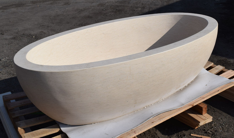 bathtub made of natural cream marble