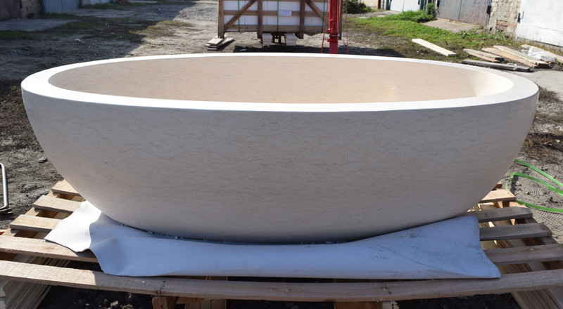 bathtub made of natural cream marble